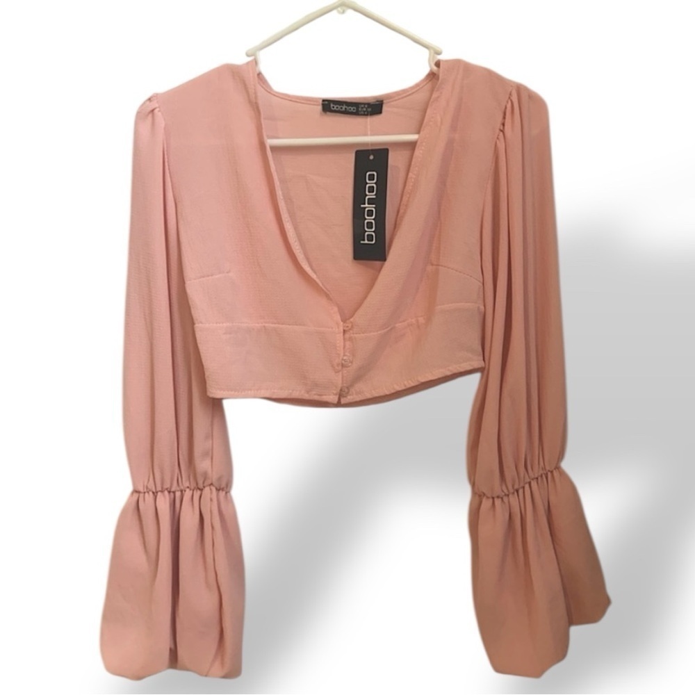 Blush statement sleeve top